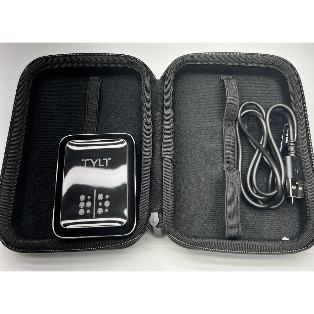 TYLT power adaptor with Travel Case and a Micro USB Cable.